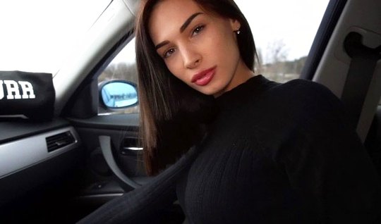 Russian brunette in the car makes his friend a Blowjob and takes the cum